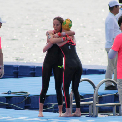 Chloe Gubecka and Mackenzie Brazier embrace post-race.