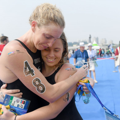 Kareena Lee embraces Chelsea Gubecka post-race.