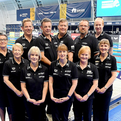 Faye Lewis stands front and centre with fellow FINA TOs.